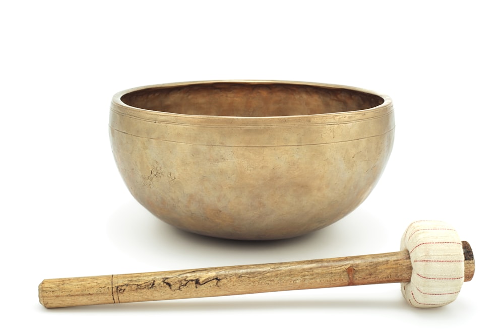 Antique singing bowl  with a mallet. Singing bowls meditation 